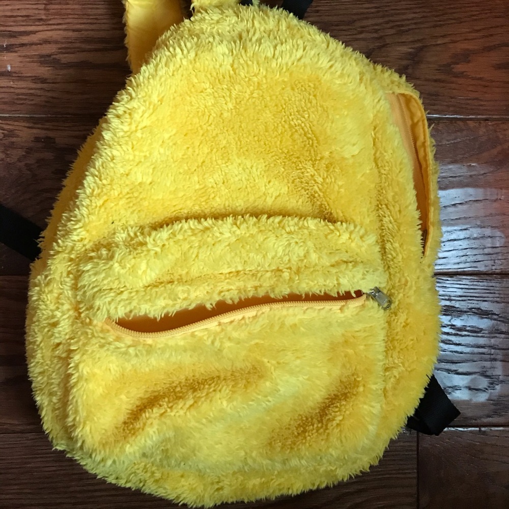 Yellow Uniqlo Backpack